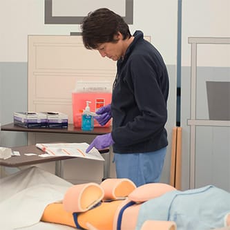 Ximedica Minneapolis employee in simulation lab